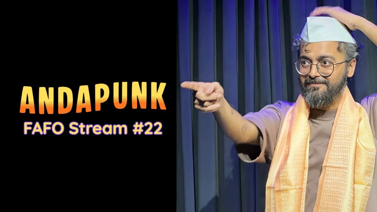 Thumbnail for Andapunk, FAFO Stream #22: Meghnad on stage in a Gandhi topi, pointing